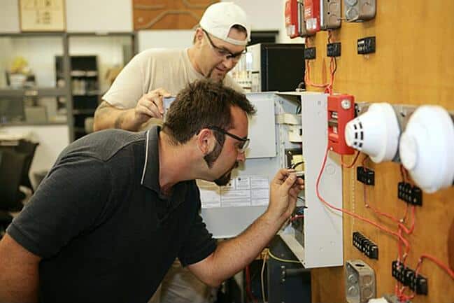 Electrical safety worker providing hands-on training