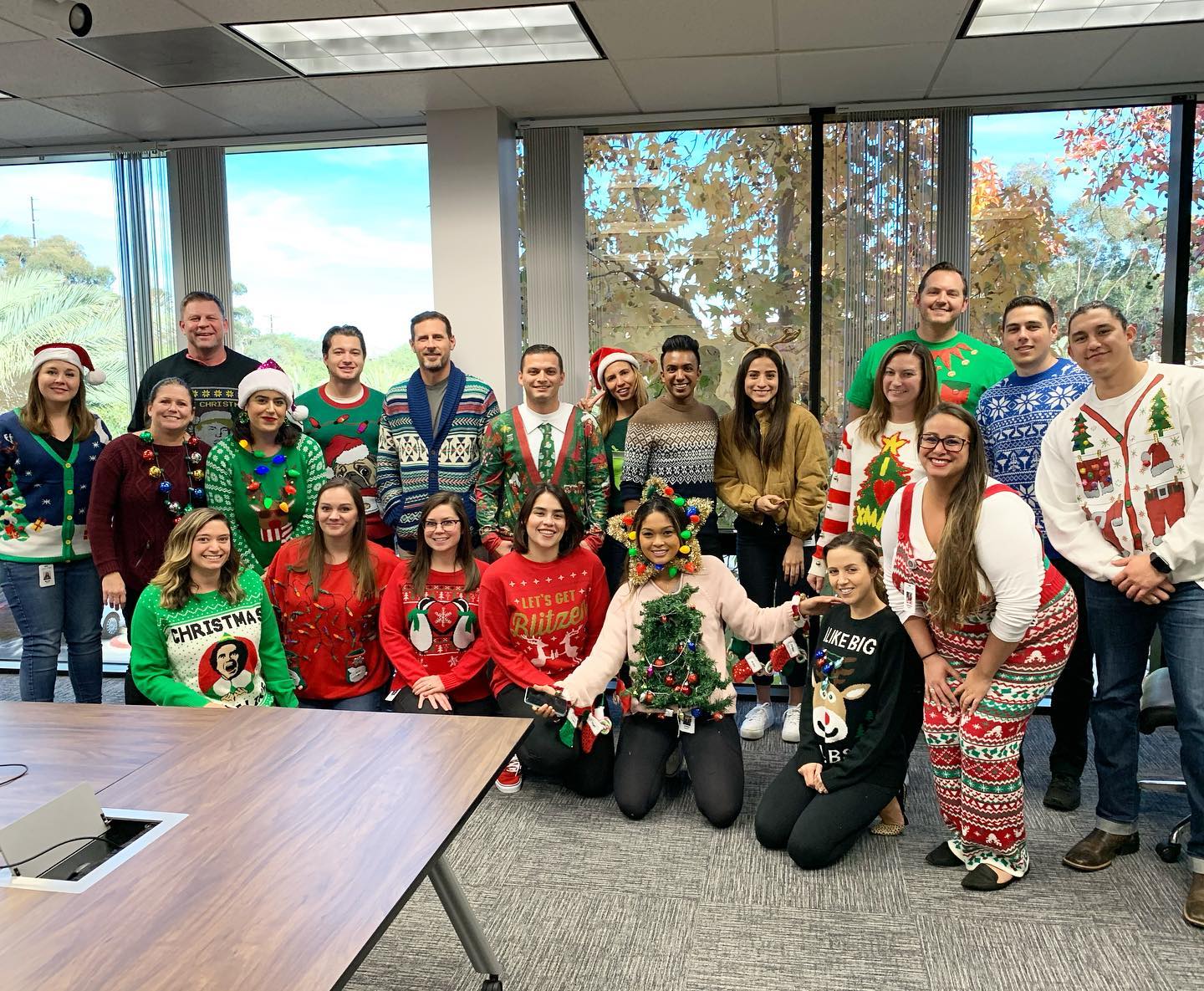 Company employee ugly christmas sweater party