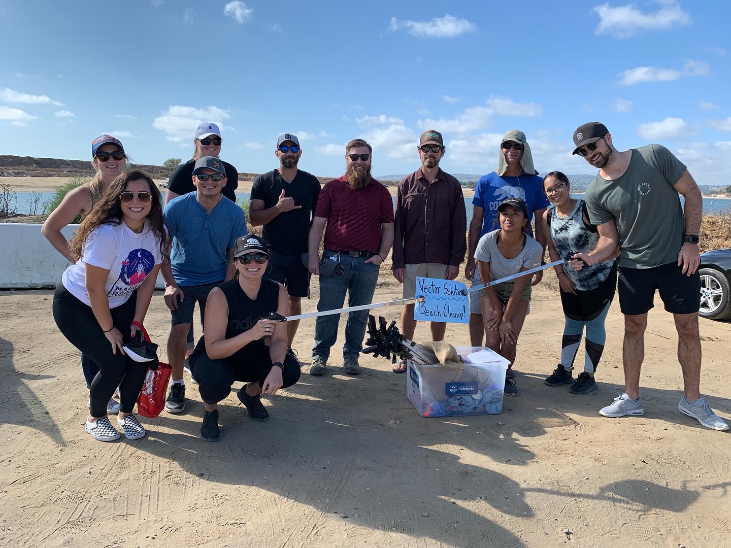 Vector Solutions Employee beach cleanup