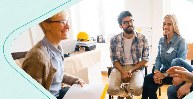 Educators talking together