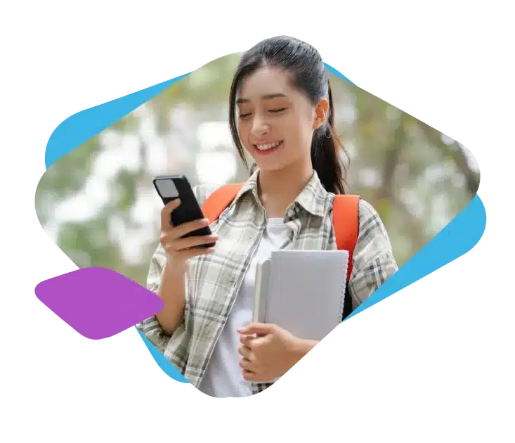 A student looking at a mobile phone