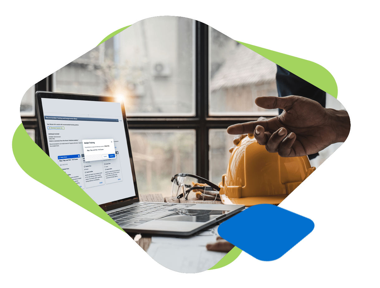 Safety manager reviewing digital incident report on laptop at jobsite