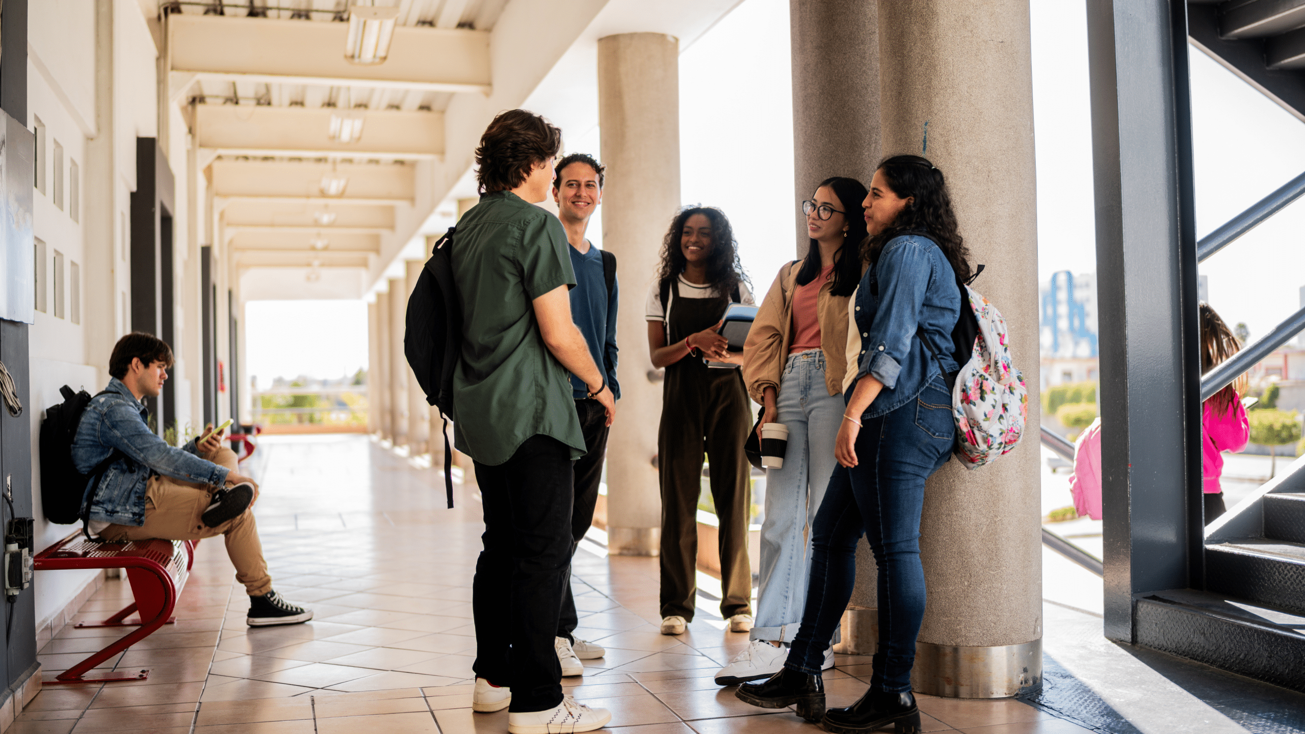 Students standing on a high school campus