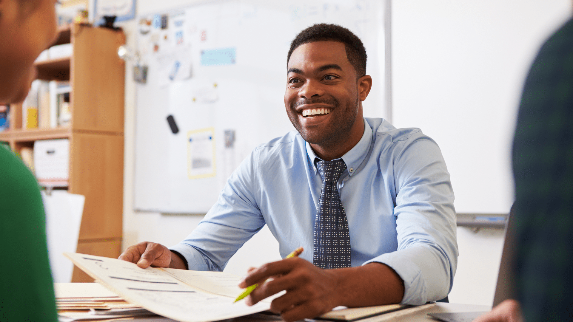 A smiling elementary teacher