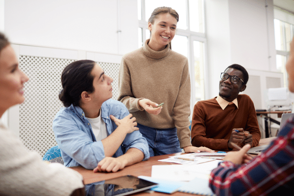 A group of college students working together