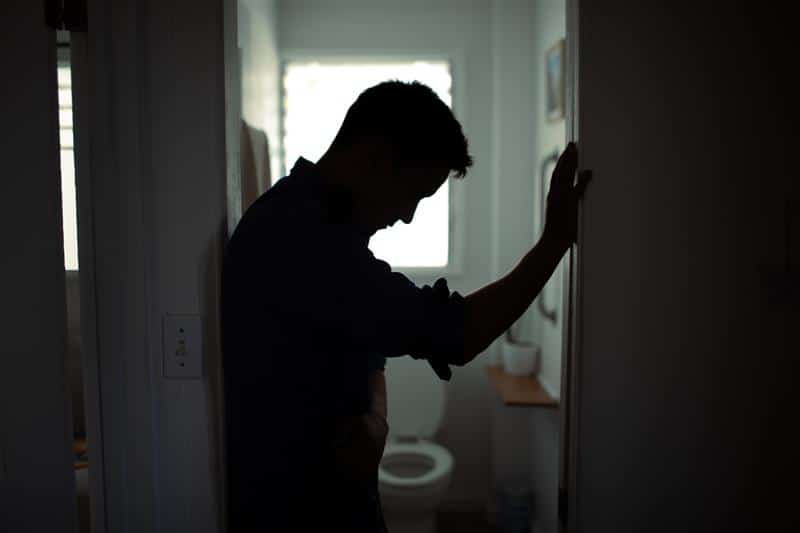 A photo of an officer demonstrating mental health issues in law enforcement.