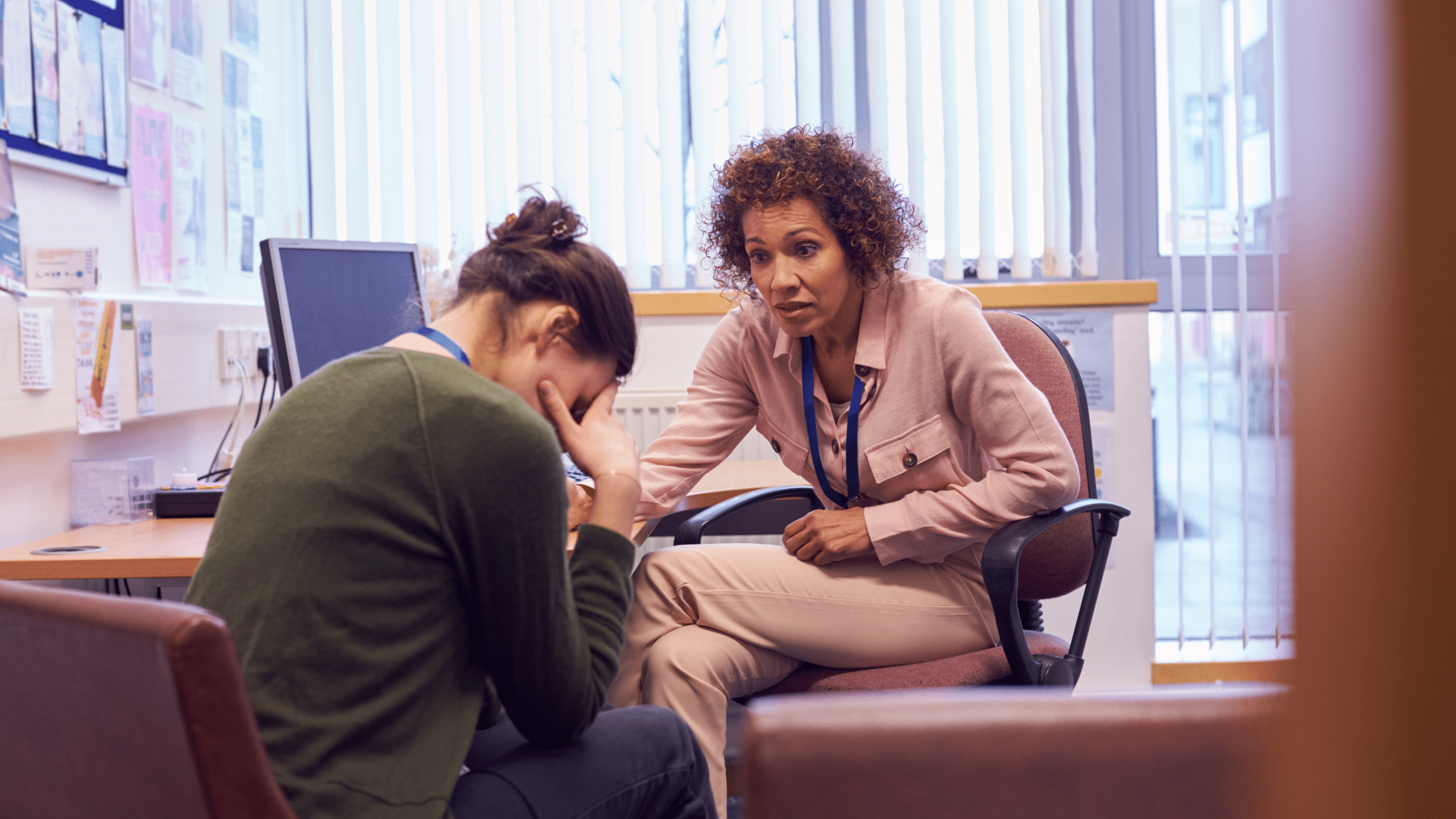 Counselor supporting K-12 student