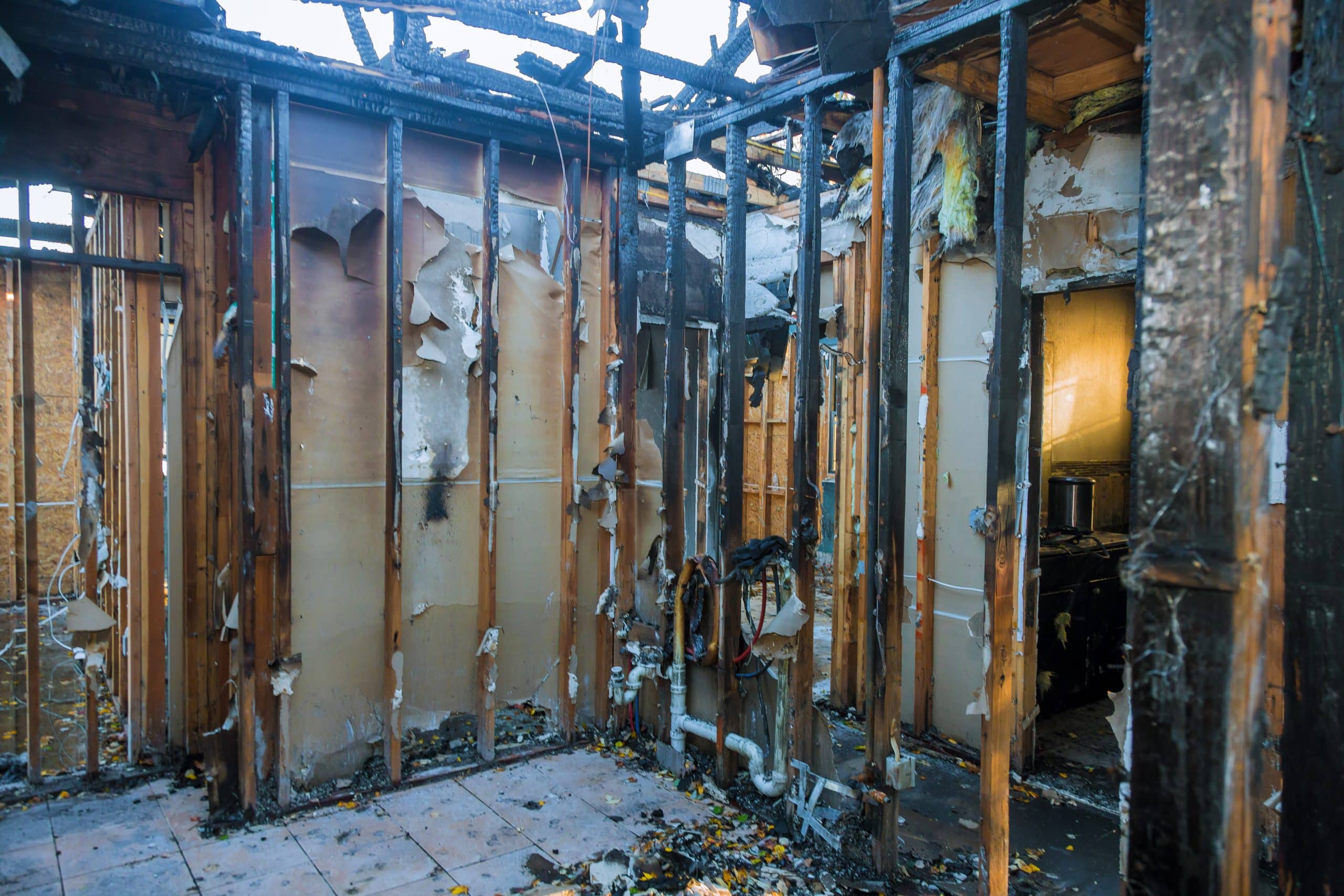 A burned building interior where many chemical exposure occur for firefighters
